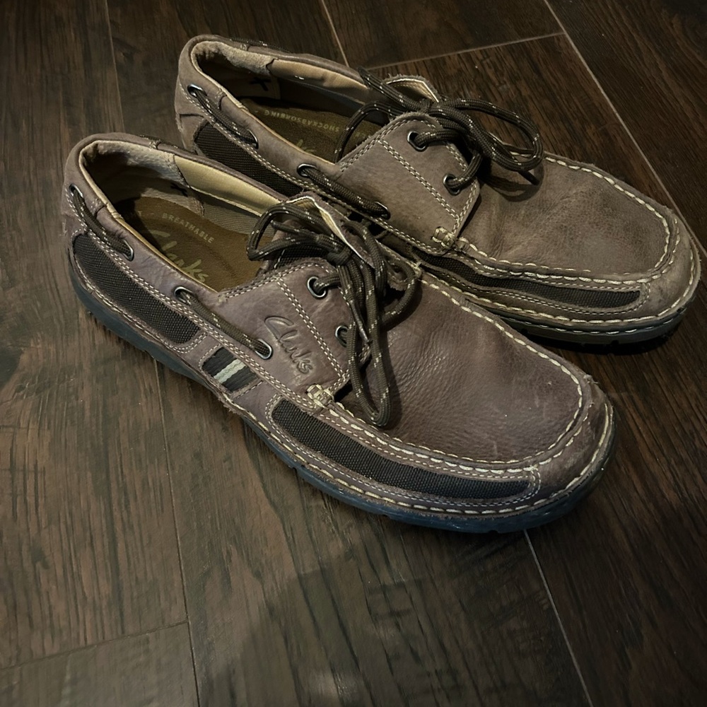 Clarks size 9 brown shoes. One is a 9 and other a 9 1/2 but both fit like a 9